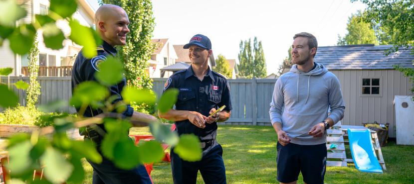 Fire department members assessing a residential home