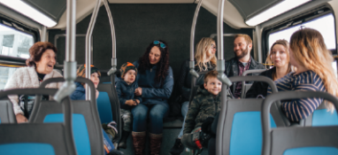 Group of riders on a transit bus